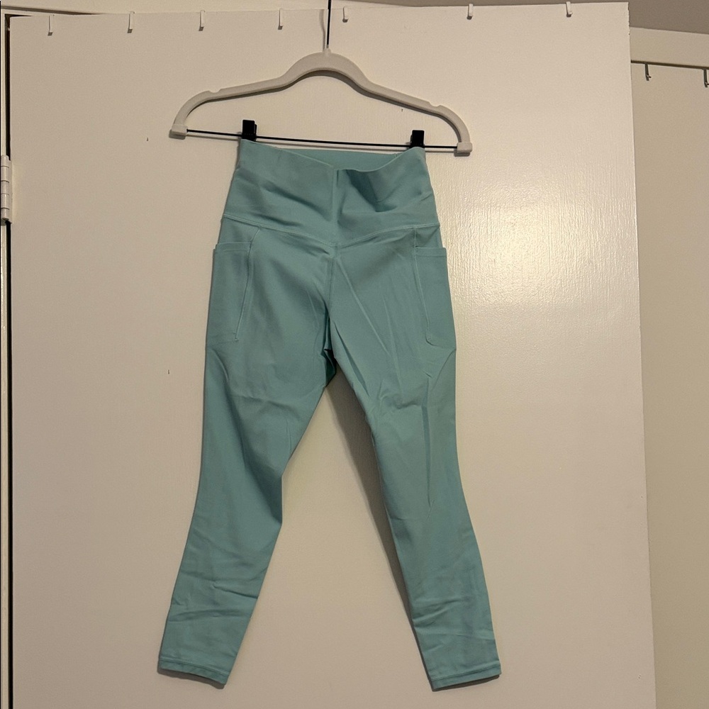 Athleta Salutation Stash Pocket 7/8 Legging sea foam green